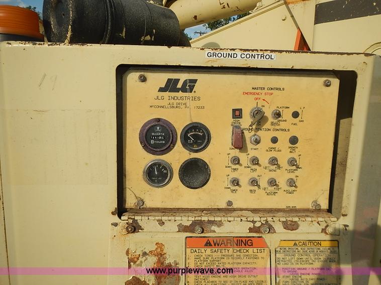 image for item I3618 1990 JLG 60HA boom lift