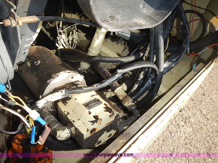 image for item I3618 1990 JLG 60HA boom lift