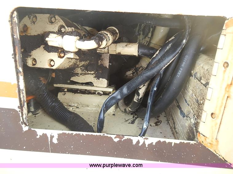 image for item I3618 1990 JLG 60HA boom lift