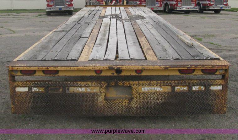image for item AS9187 1999 Trail King TK50RB-3000 roll back flatbed trailer