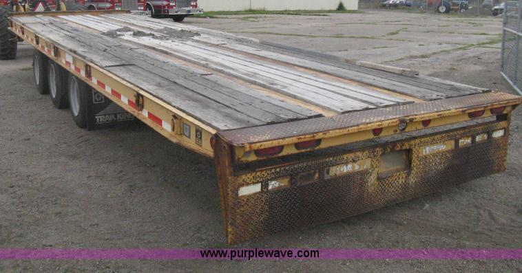 image for item AS9187 1999 Trail King TK50RB-3000 roll back flatbed trailer