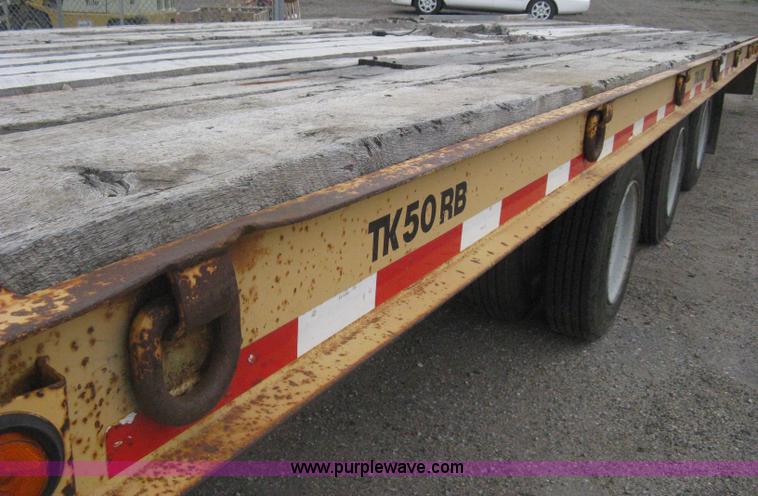 image for item AS9187 1999 Trail King TK50RB-3000 roll back flatbed trailer