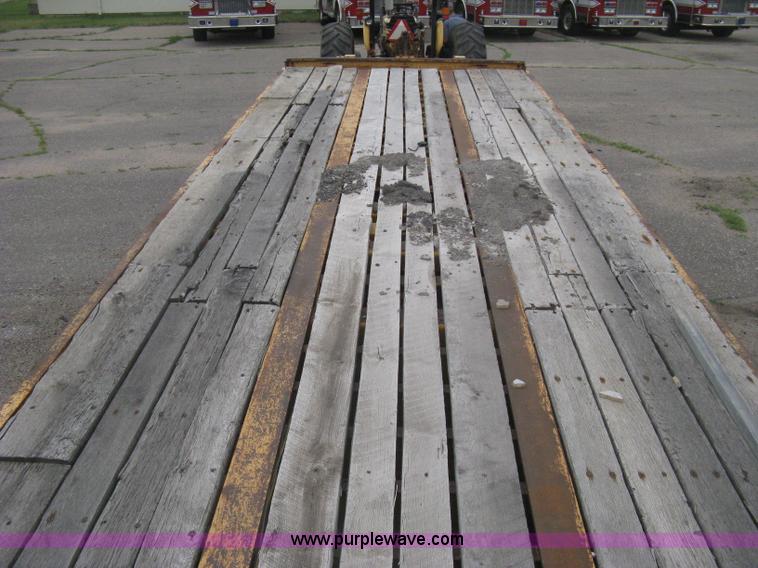 image for item AS9187 1999 Trail King TK50RB-3000 roll back flatbed trailer