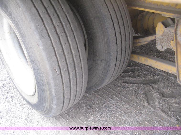 image for item AS9187 1999 Trail King TK50RB-3000 roll back flatbed trailer