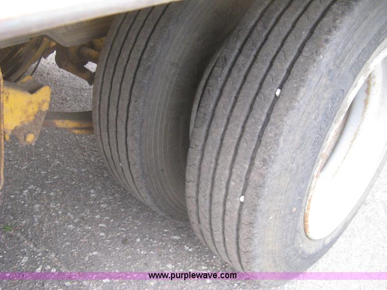 image for item AS9187 1999 Trail King TK50RB-3000 roll back flatbed trailer