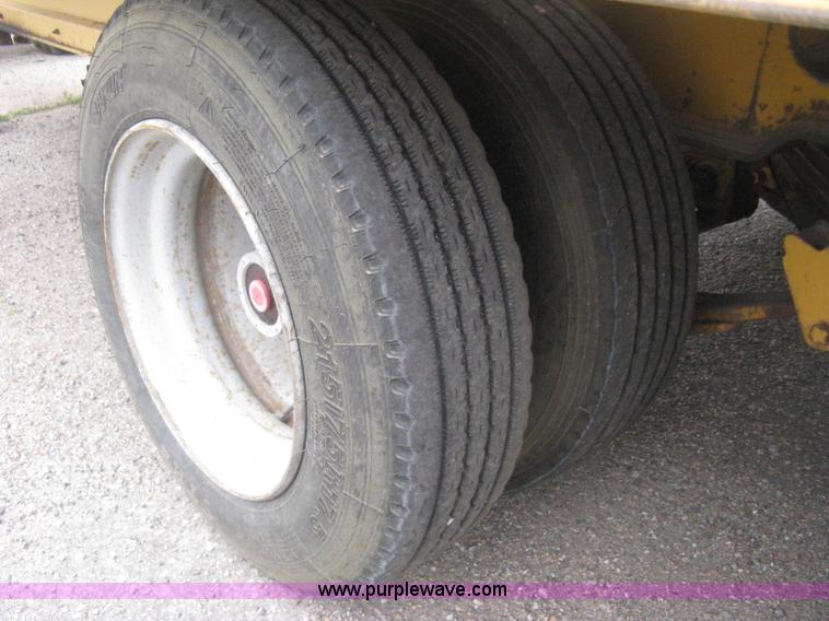 image for item AS9187 1999 Trail King TK50RB-3000 roll back flatbed trailer