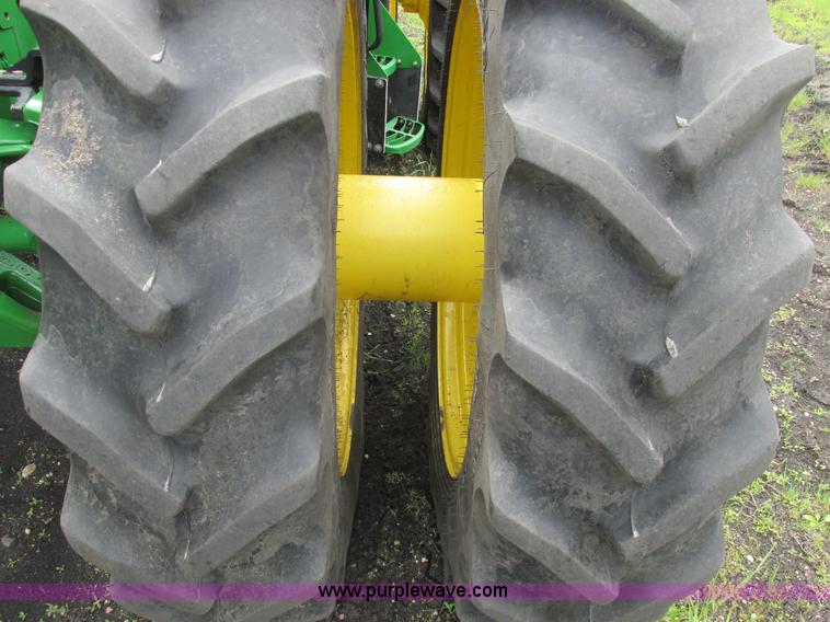 image for item A8721 2012 John Deere 8285R MFWD tractor