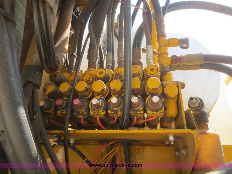 image for item F6998 1993 Ag-Chem RoGator 854 self-propelled sprayer