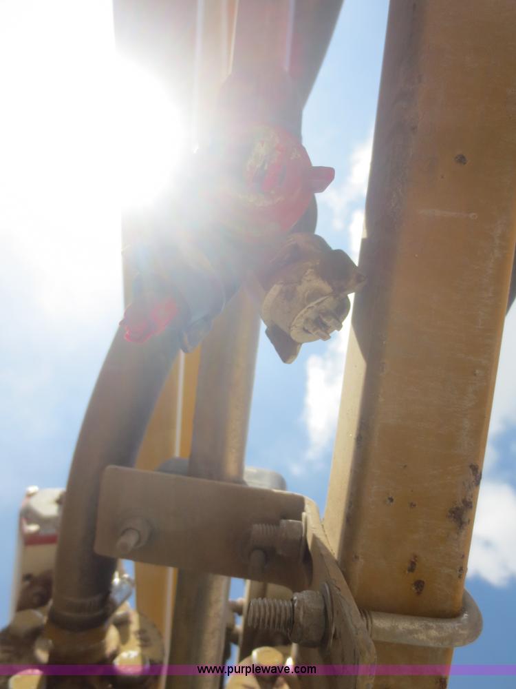 image for item F6998 1993 Ag-Chem RoGator 854 self-propelled sprayer