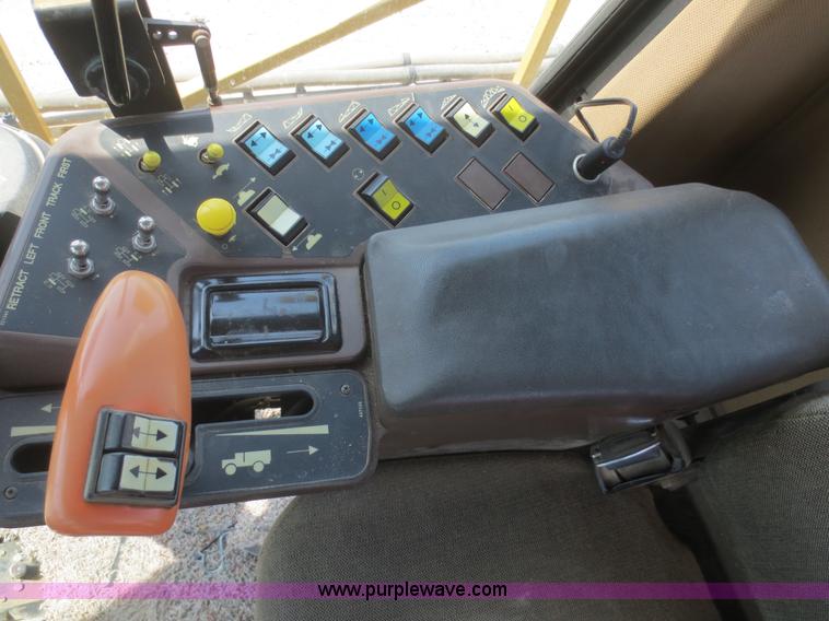 image for item F6998 1993 Ag-Chem RoGator 854 self-propelled sprayer