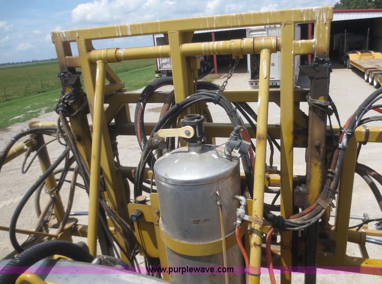 image for item F6998 1993 Ag-Chem RoGator 854 self-propelled sprayer