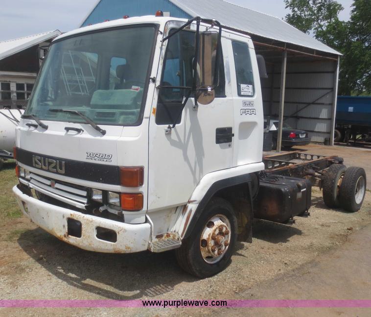 image for item F6980 1997 Isuzu FRR truck cab and chassis