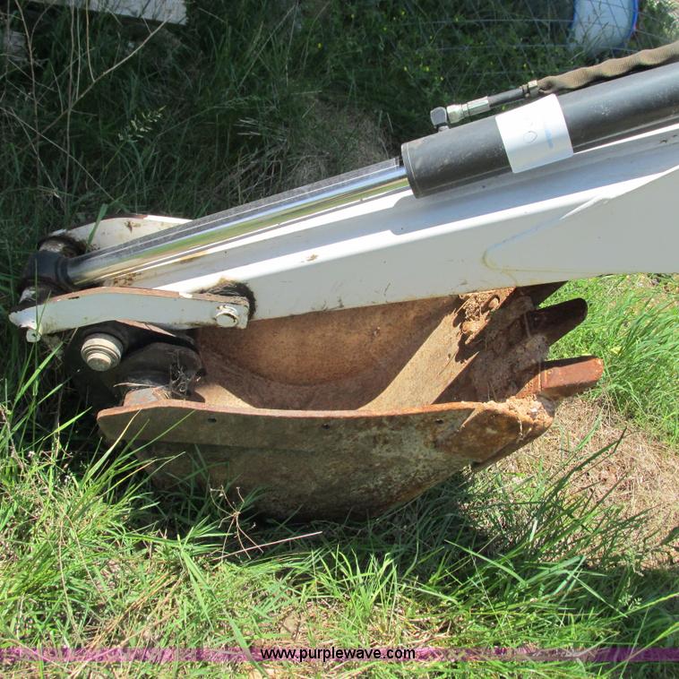 image for item G9301 Bobcat 8709 skid steer backhoe attachment