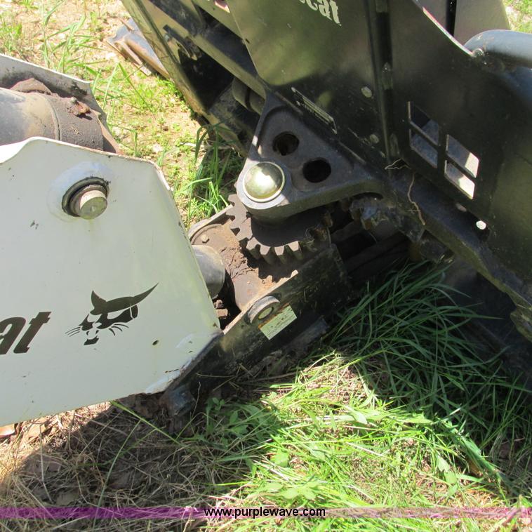 image for item G9301 Bobcat 8709 skid steer backhoe attachment