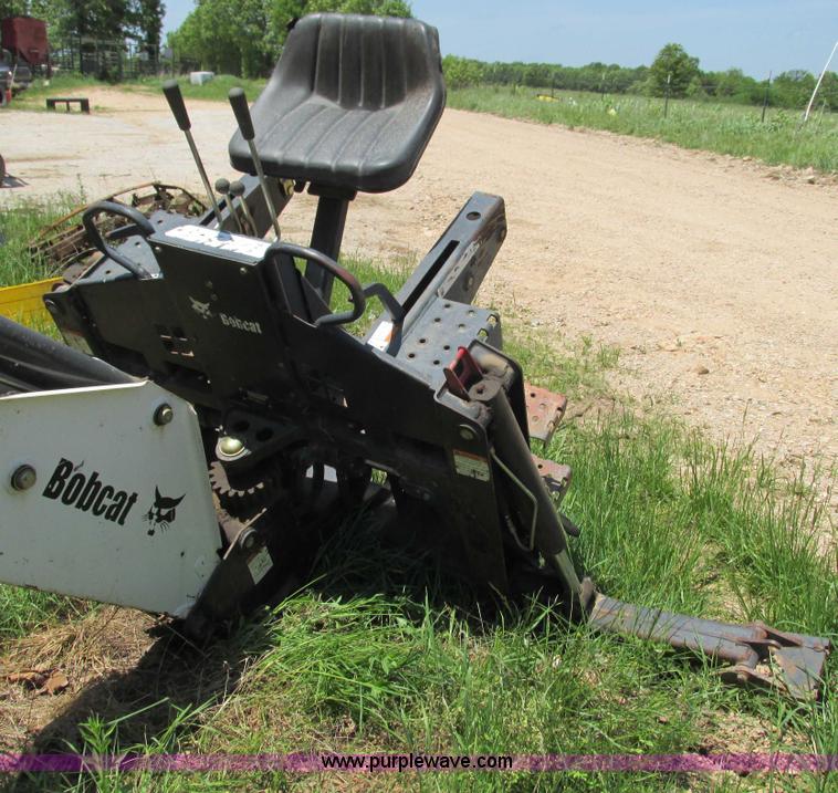 Bobcat 8709 skid steer backhoe attachment in Montreal, MO Item G9301
