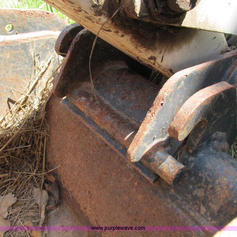 image for item G9301 Bobcat 8709 skid steer backhoe attachment