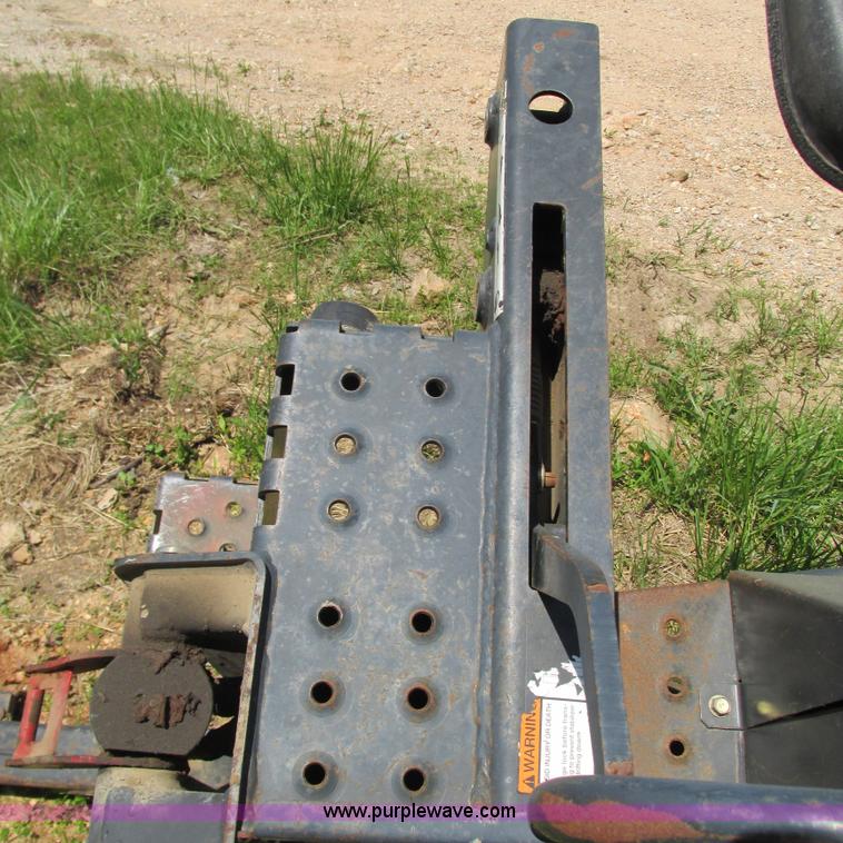 image for item G9301 Bobcat 8709 skid steer backhoe attachment