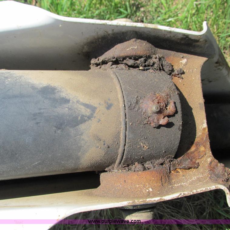 image for item G9301 Bobcat 8709 skid steer backhoe attachment