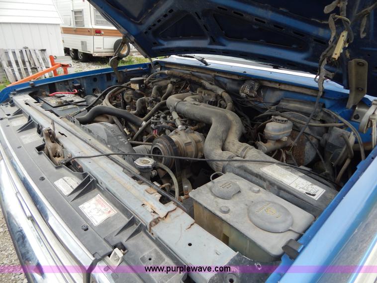 image for item H3321 1988 Ford F250 flatbed truck