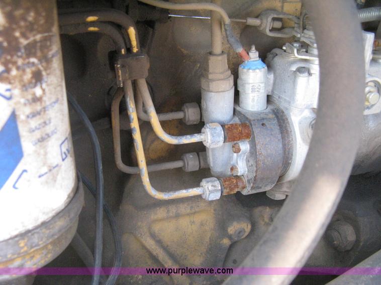 image for item H6343 Ford 555D backhoe