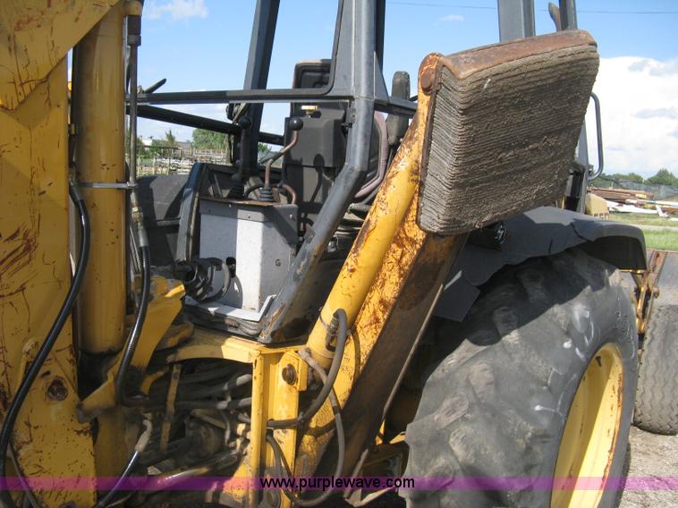 image for item H6343 Ford 555D backhoe
