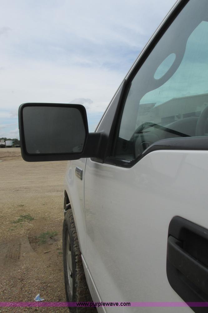 image for item I9610 2004 Ford F150 XLT SuperCrew pickup truck