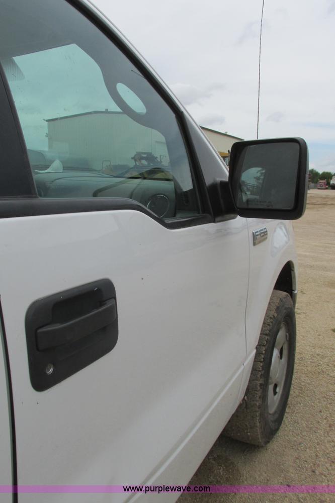 image for item I9610 2004 Ford F150 XLT SuperCrew pickup truck