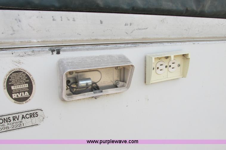 image for item I9611 2000 Coleman pop up camper