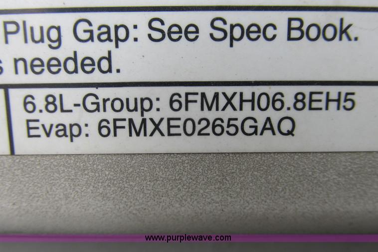 image for item I9649 2006 Ford 801 shuttle bus