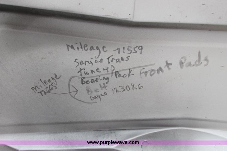 image for item I9649 2006 Ford 801 shuttle bus