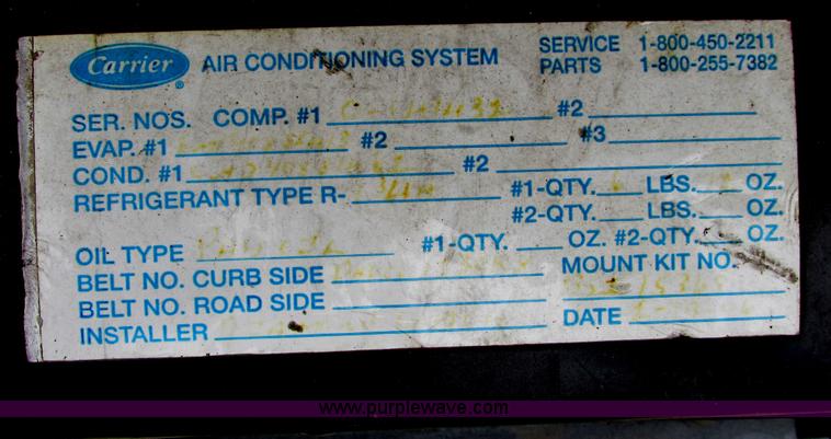 image for item I9651 2006 Ford 801 shuttle bus