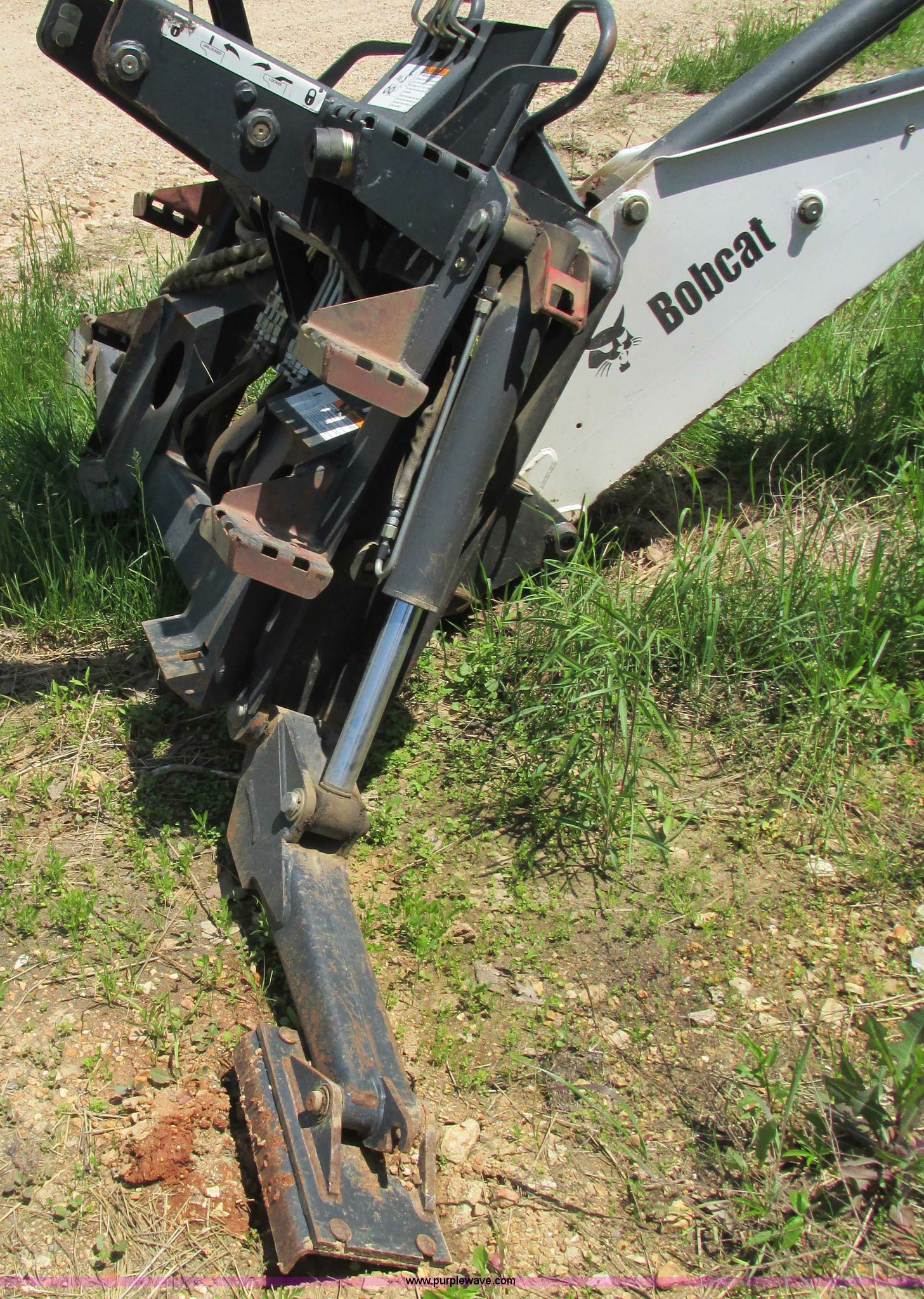 Bobcat 8709 skid steer backhoe attachment in Montreal, MO Item G9301