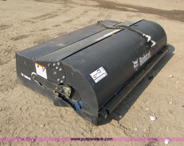 image for item I3948 2011 Bobcat 84 sweeper skid steer attachment