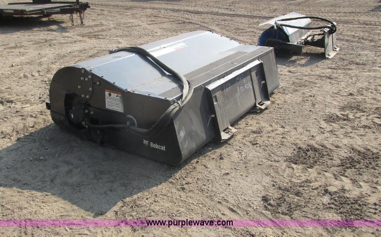 image for item I3948 2011 Bobcat 84 sweeper skid steer attachment