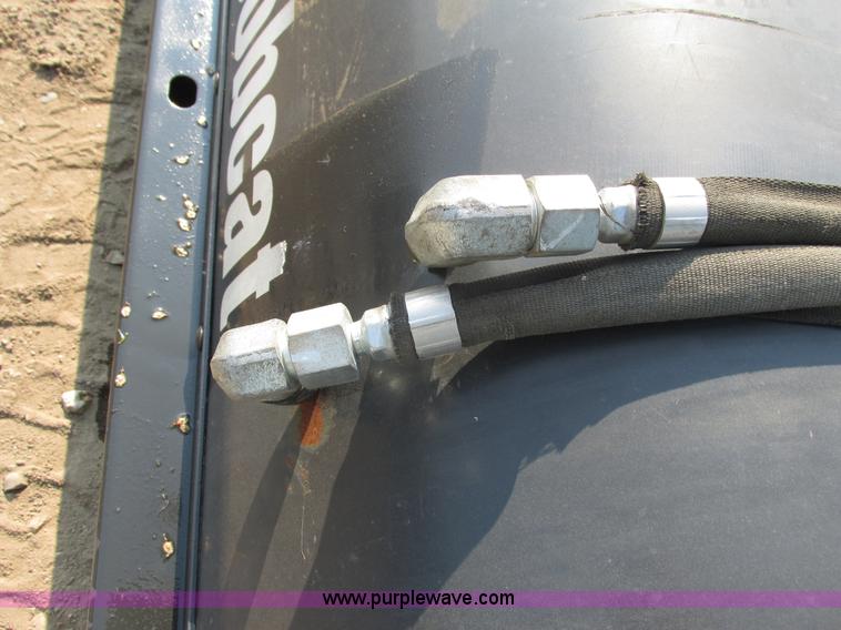 image for item I3948 2011 Bobcat 84 sweeper skid steer attachment