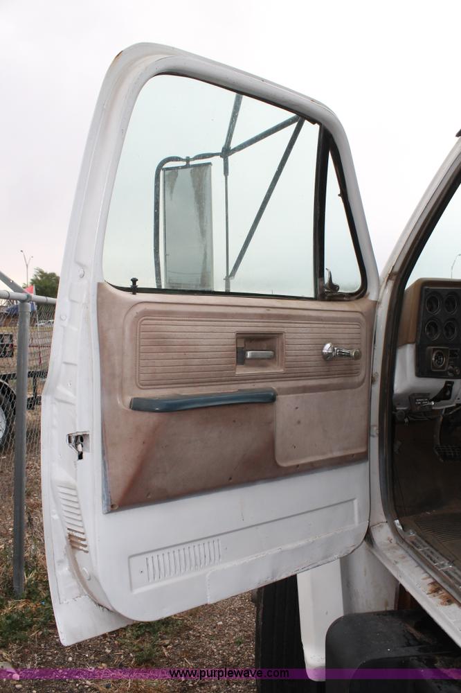 image for item C3871 1980 GMC roll back truck