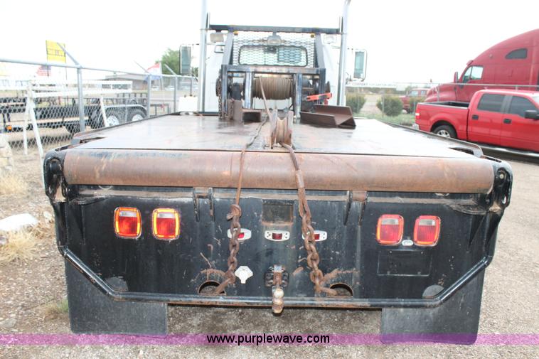 image for item C3871 1980 GMC roll back truck