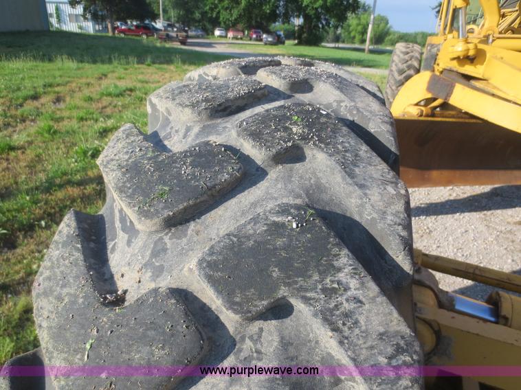 image for item D2077 1997 Caterpillar 120H articulated motor grader