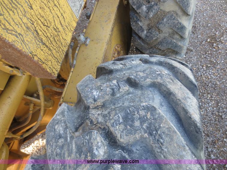 image for item D2077 1997 Caterpillar 120H articulated motor grader