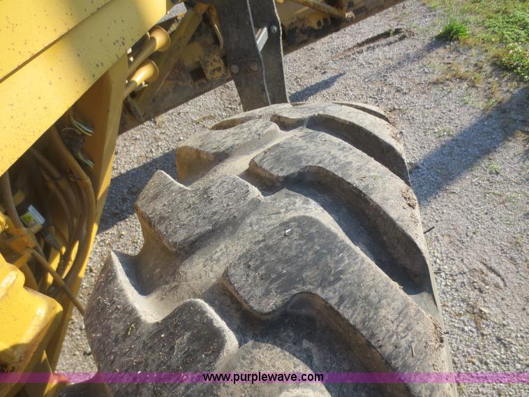 image for item D2077 1997 Caterpillar 120H articulated motor grader