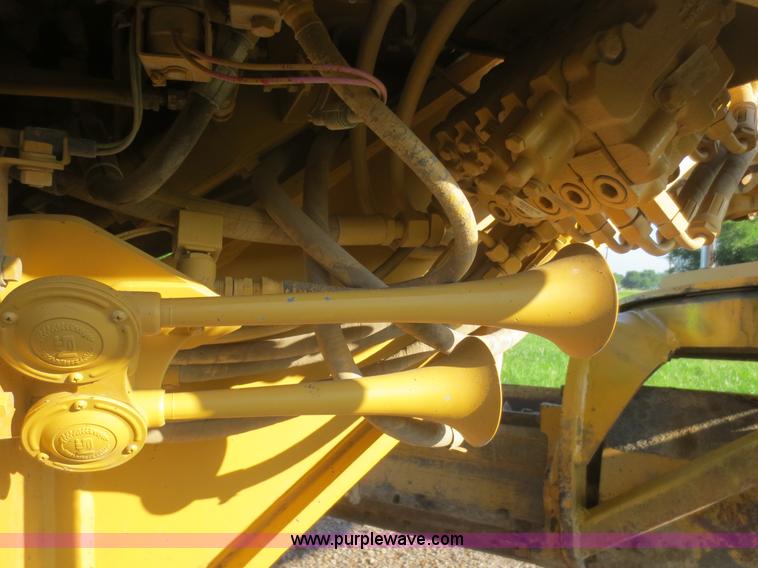 image for item D2077 1997 Caterpillar 120H articulated motor grader
