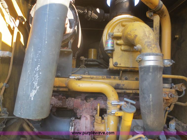 image for item D2077 1997 Caterpillar 120H articulated motor grader