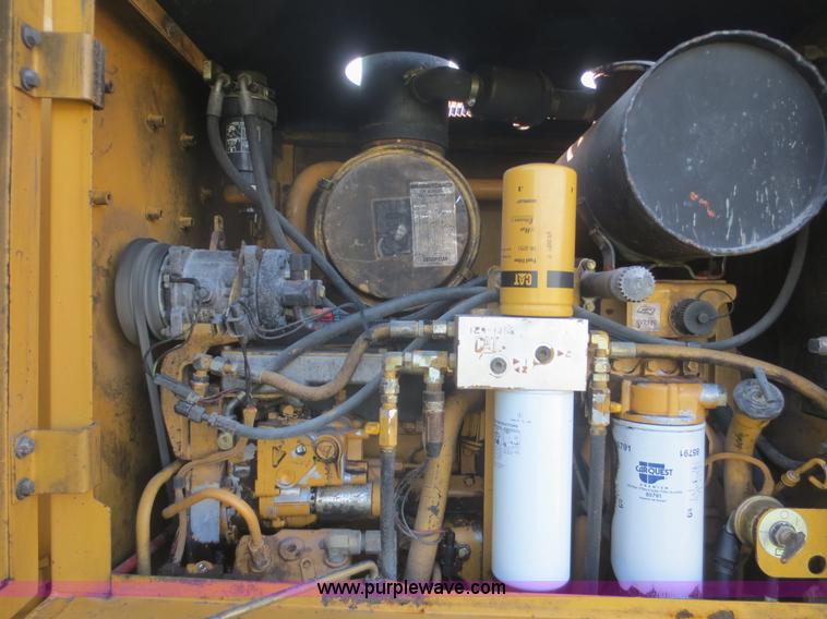 image for item D2077 1997 Caterpillar 120H articulated motor grader