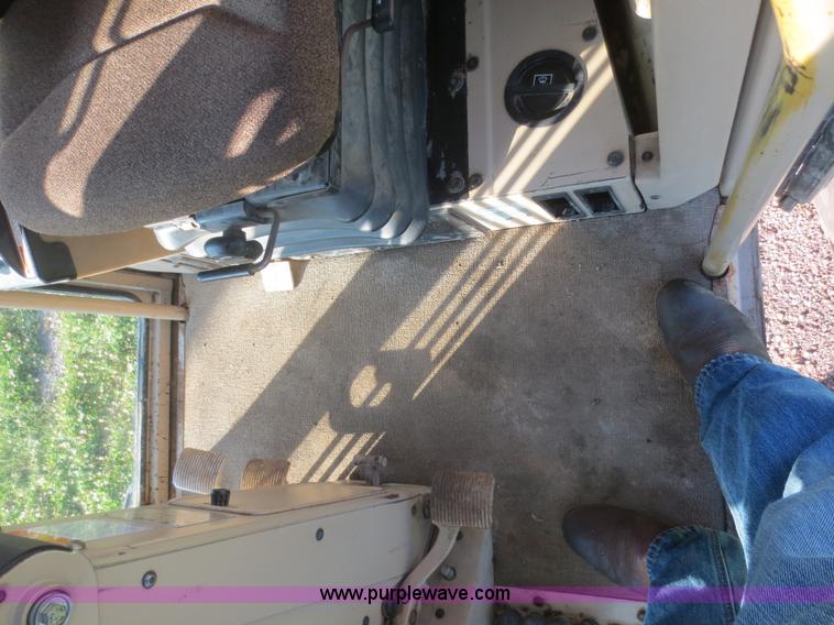 image for item D2077 1997 Caterpillar 120H articulated motor grader