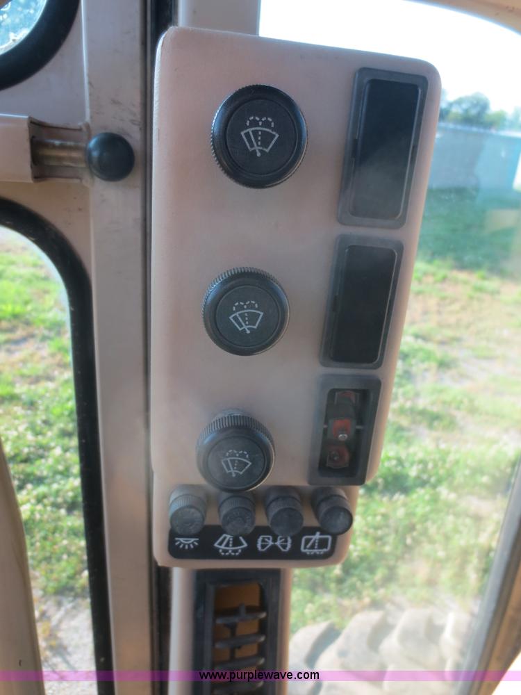 image for item D2077 1997 Caterpillar 120H articulated motor grader