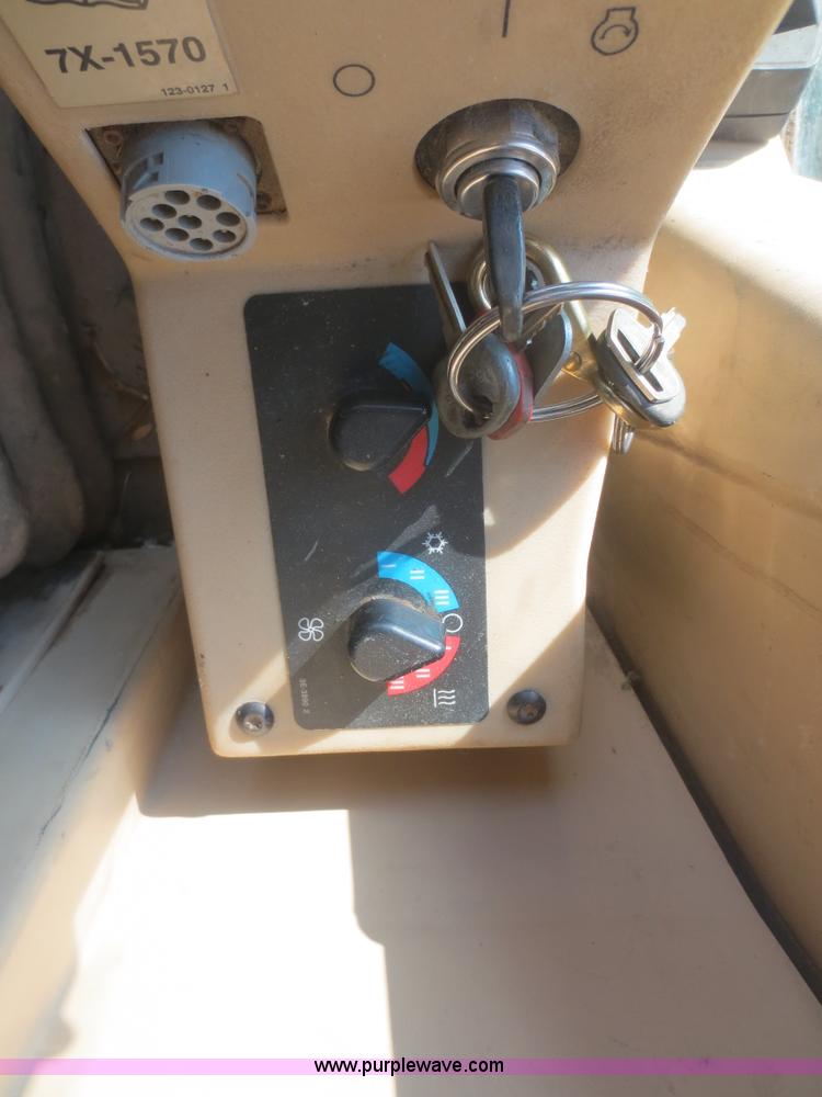 image for item D2077 1997 Caterpillar 120H articulated motor grader