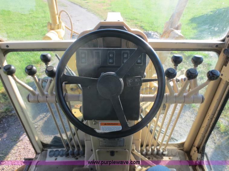 image for item D2077 1997 Caterpillar 120H articulated motor grader