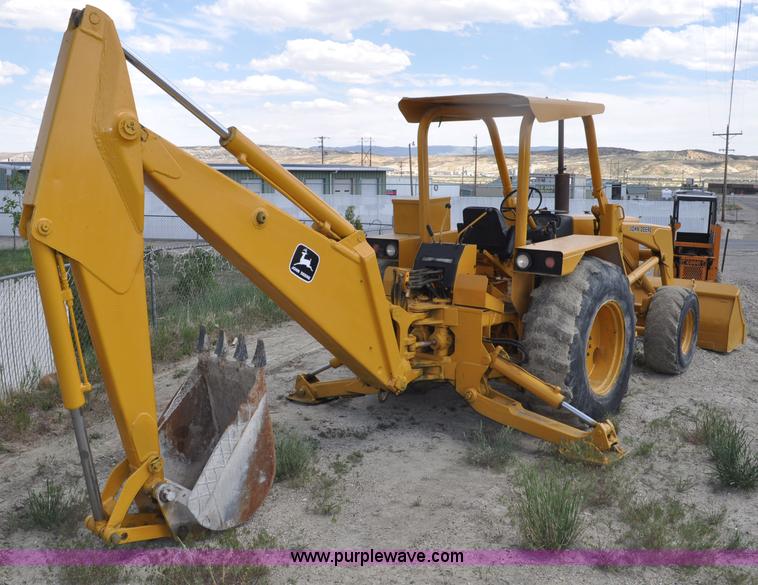 image for item F2004 John Deere 500C backhoe