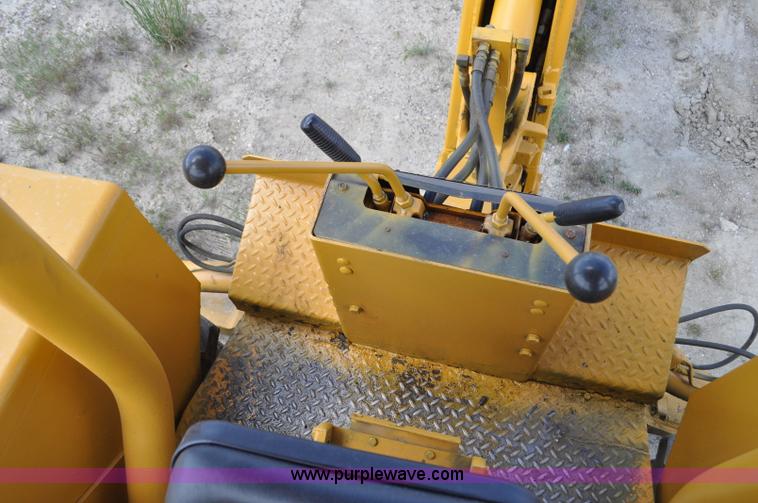 image for item F2004 John Deere 500C backhoe