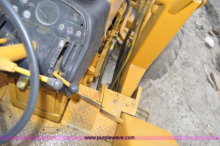 image for item F2004 John Deere 500C backhoe